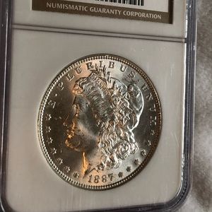1887 Morgan silver dollar NGC MS65
